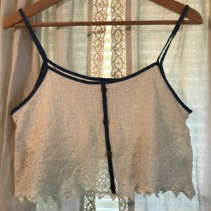 Lace with jean outline mid drift tank top.